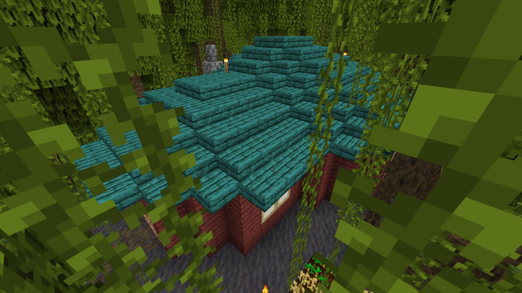 A screenshot of Minecraft depicting a home made of mangrove wood with a warped wood roof nestled tightly in a mangrove swamp. Vines hang in the foreground.