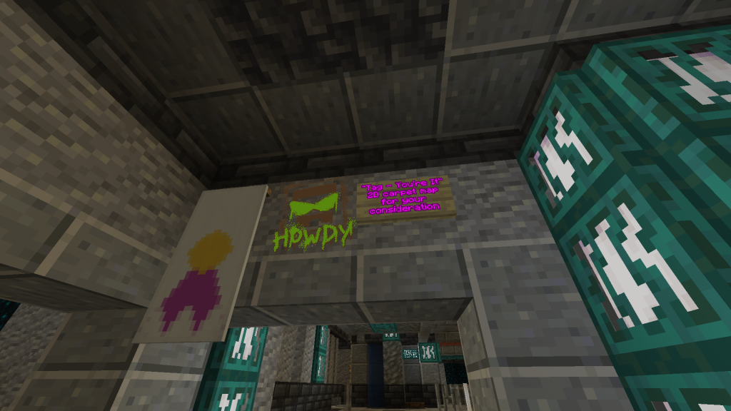 A screenshot of map art in Minecraft. It looks like graffiti spray tag, it resembles Joe Hills' Minecraft character with green glasses saying "HOWDY!" 