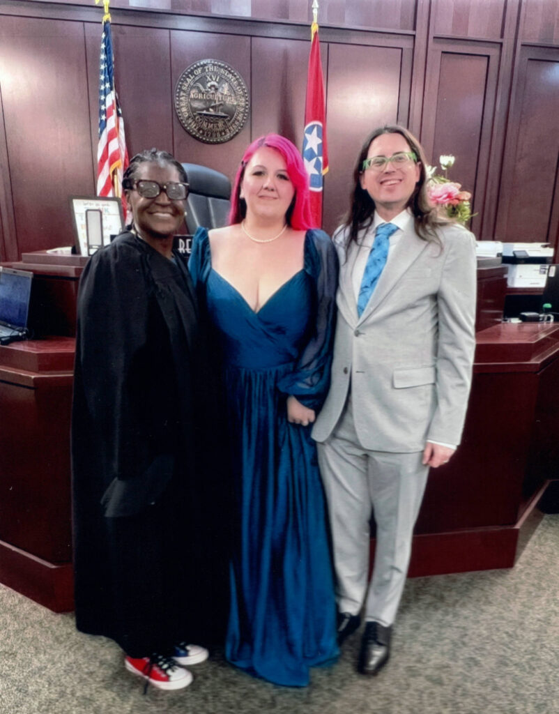 A photo of Judge Hayes with Lauryn Hills and Joe Hills