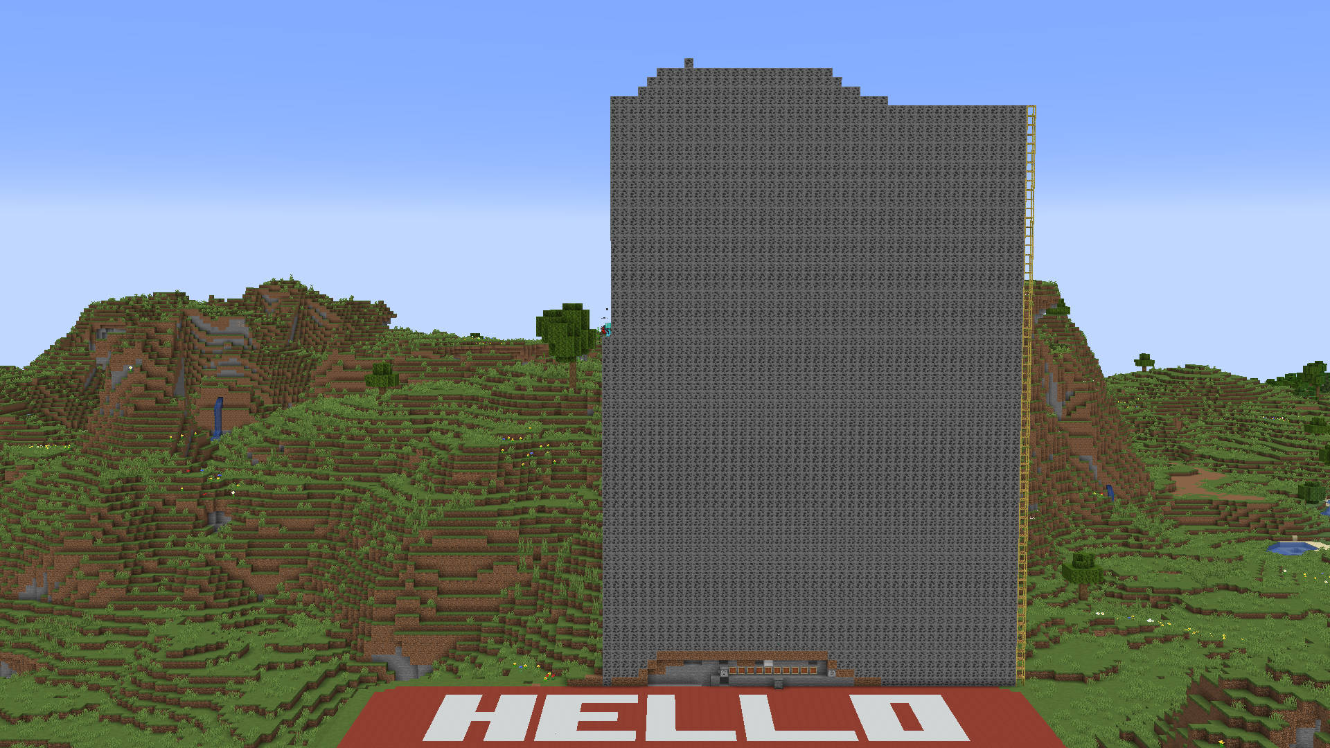 A screenshot of Minecraft showing a 64-block-high wall of coal partially completed above a 81-block-wide name tag that says "Hello"