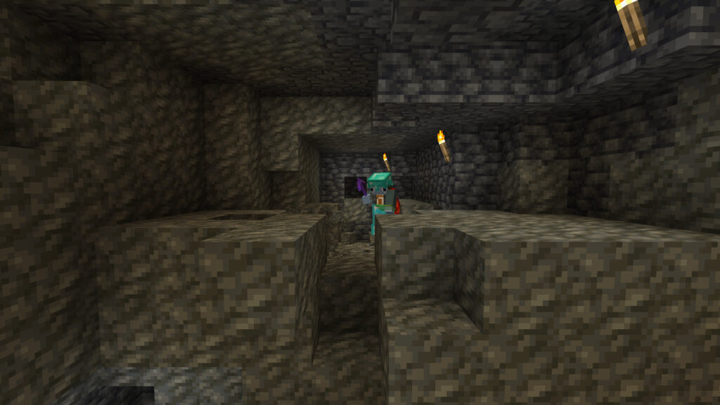 A screenshot of Minecraft showing Joe Hills mining for tuff.