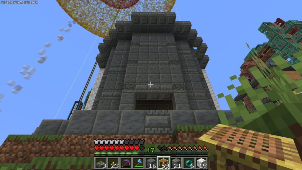 A screenshot of Minecraft showing Joe’s shop with its columns doubled in height and capped by another circular base. 