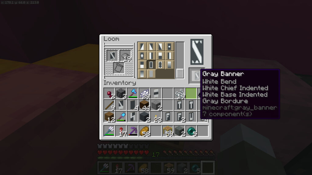 A screenshot of Minecraft showing The loom interface. Joe Hills has created a white on grey letter S with what appear to be teeth for the top and bottom of the character