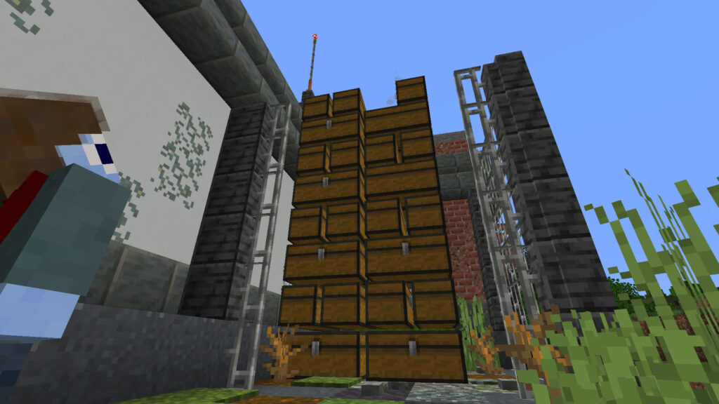 A screenshot of Minecraft showing Docm77's Wash and Fold laundromat loading dock with 62 chests worth of dirt loaded to look like two columns of triple-stacked pallets.