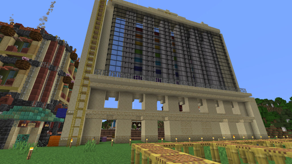 A screenshot of Minecraft showing the inside of the Wool Street facade. The flag is barely noticeable through the black glass.